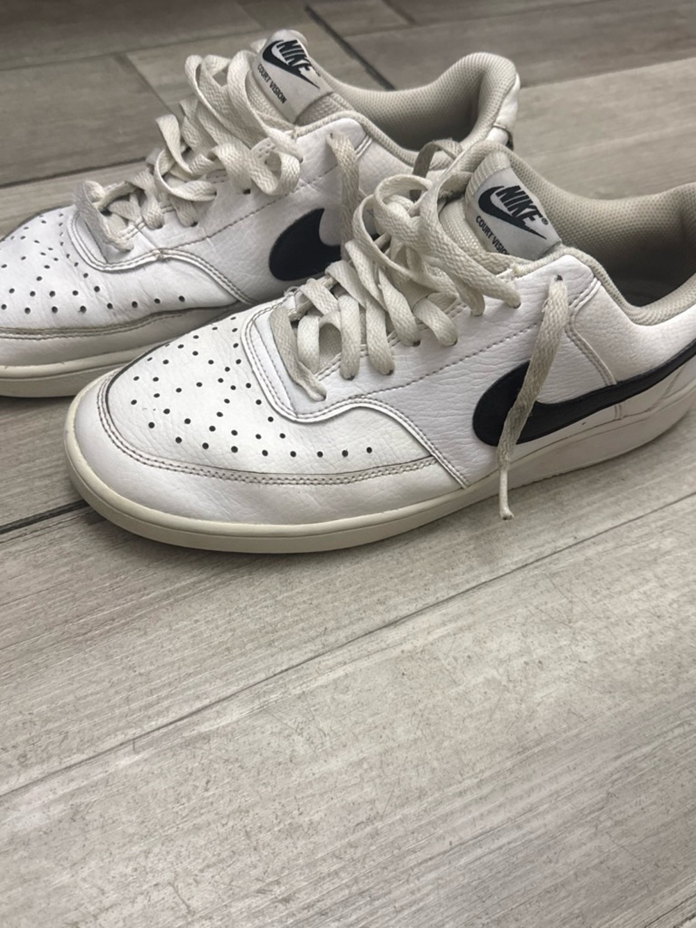 Nike Men’s White Sneakers with Black Swoosh
